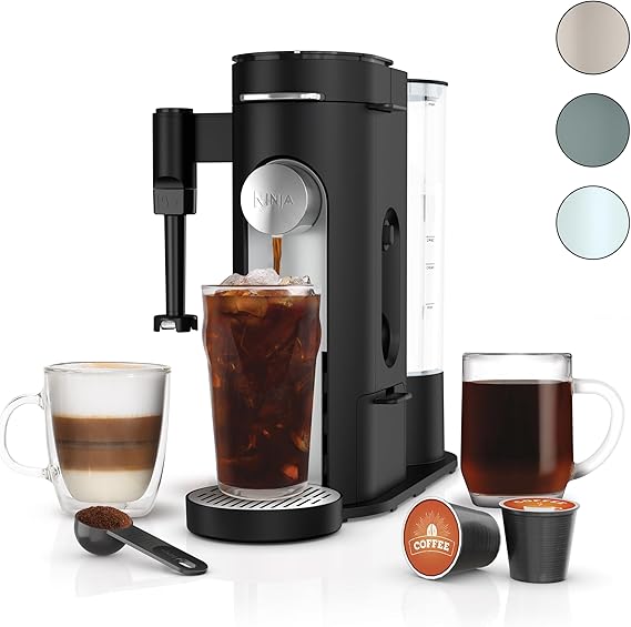 Ninja Pod & Grounds Specialty Single-Serve Coffee Maker PB051 with built-in milk frother, removable water reservoir, and compact black design on kitchen counter